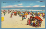 A postcard depicting African Americans vacationing on the beach. It reads “Beach Scene at Atlantic Beach, S.C.”