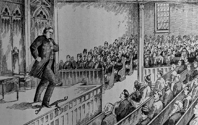 Drawing of a man on stage stomping on chains before onlookers.